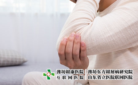 攝圖網_500708291_生病的年輕人胳膊疼（企業商用）關節